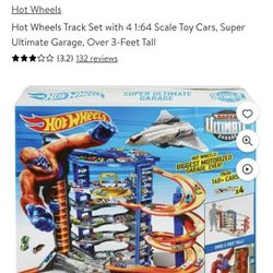 Hot Wheels Track Set with 4 1:64 Scale Toy Cars, Super Ultimate Garage, Over 3-Feet Tall

