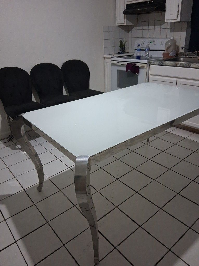 Dining Table And Five Chairs Black.