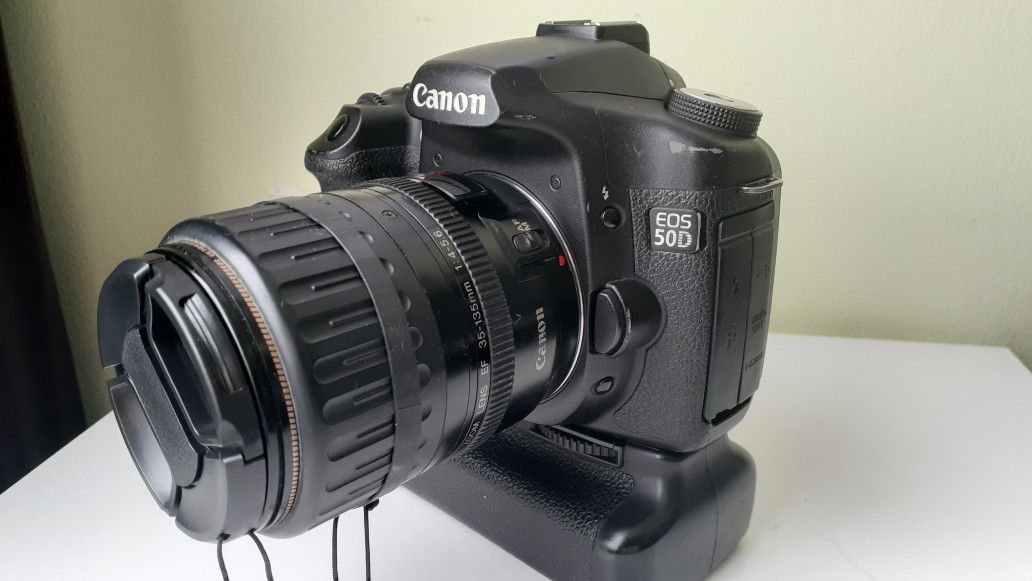 Canon EOS 50D DSRL camera with 35-135mm lens and power grip