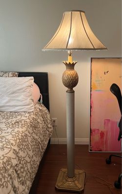 Elegant vintage floor lamp with warm gold accents