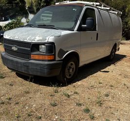 Chevy work van w ladder rack