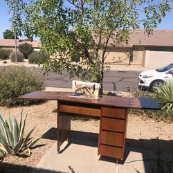 Antique Sewing Table With a  Sewing Machine