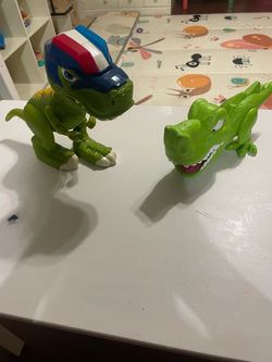 Green dinosaur lot