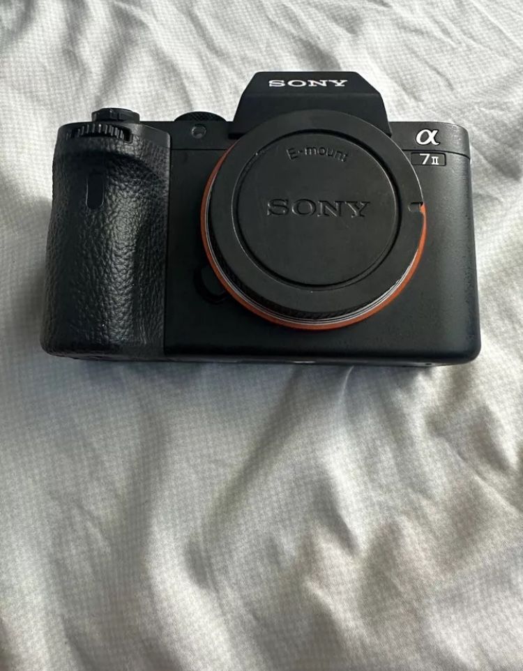 Sony Alpha A7 24.3 MP Mirrorless Digital Camera - Black (with 28-70mm Lens)