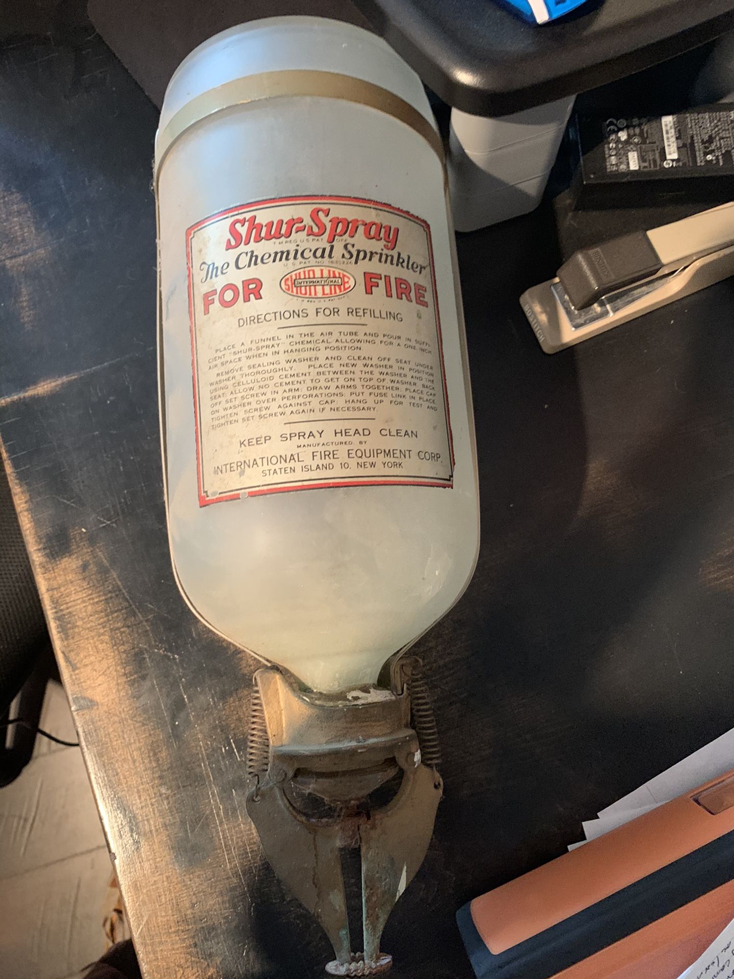 Antique glass fire extinguisher