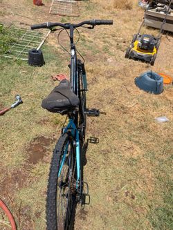 Huffy mountain bike, trail runner $50