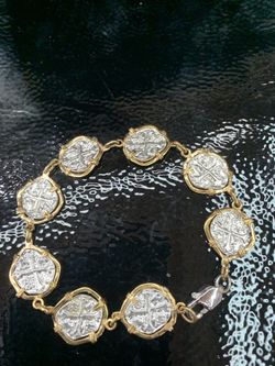 Atocha silver coin bracelet in gold bezel 7” long