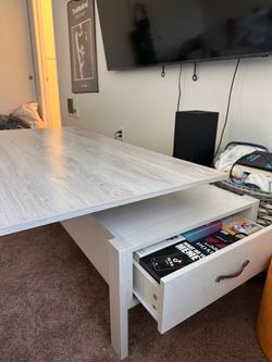 White lift top coffee table with storage drawers