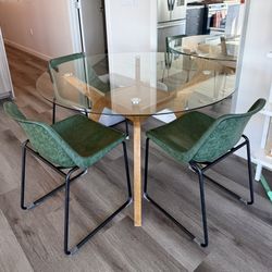 Midcentury round glass table + 4  chairs.