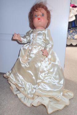 Antique Doll With Haunted Look