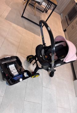 Doona+ Infant Car Seat & Stroller Travel System Pink Blush + LATCH Base | Fully Functional