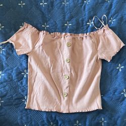 off the shoulders pink shirt
