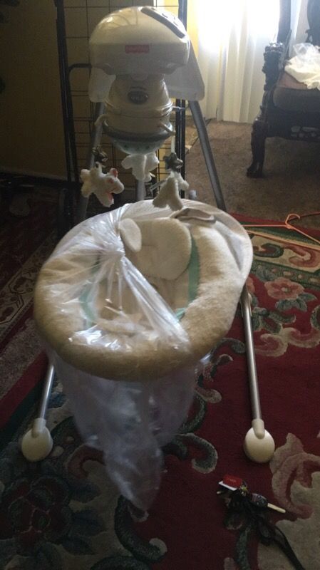Fisher price moonlight cradle swing