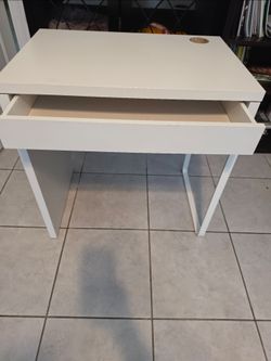Simple white desk with drawer