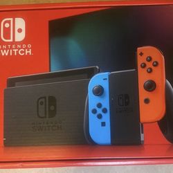  Nintendo Switch with Neon Blue and Neon Red Joy‑Con : Video  Games