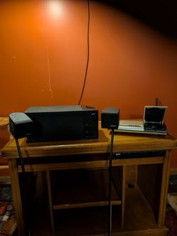 Bose woofer and four speakers and a  CD player radio combination