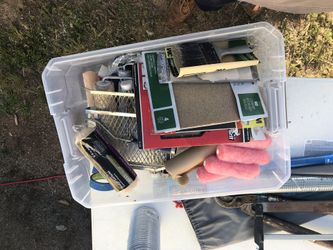 A box of new paint items
