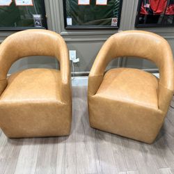 2 Swivel Leather Chairs 