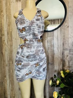 Beautiful modern dress with a unique print, size L
