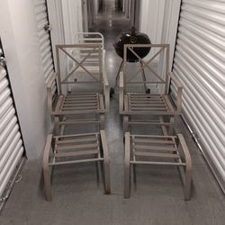Two Patio Chairs With Footstools