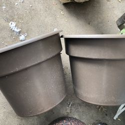 Two matching planter buckets 
