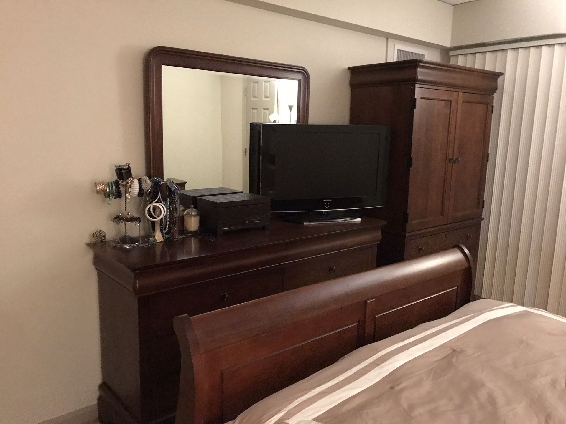 Five piece bedroom set, dressers, queen size bed, nightstands.