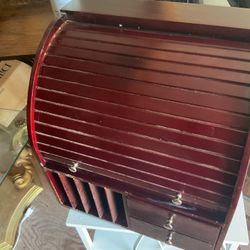 Roll top organizer it’s 15 inches tall  14 inches wide and 10 inches deep