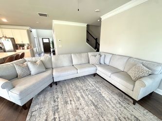 Haverty’s Jenna sectional sofa Two loveseats + angled corner wedge