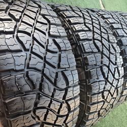 4 GOODYEAR 325-65R18 TIRES