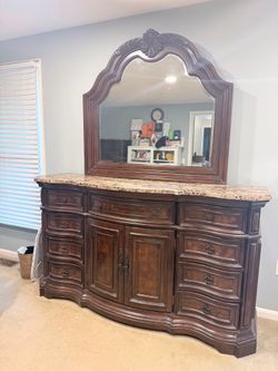 dresser with a mirror