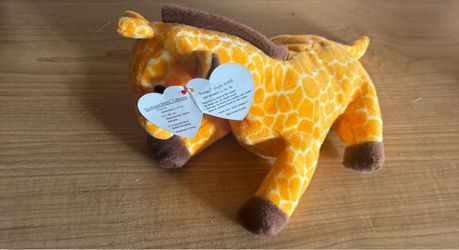 Twigs the Giraffe, a retired 1995 Ty Beanie Baby featuring a 4th-generation hang tag