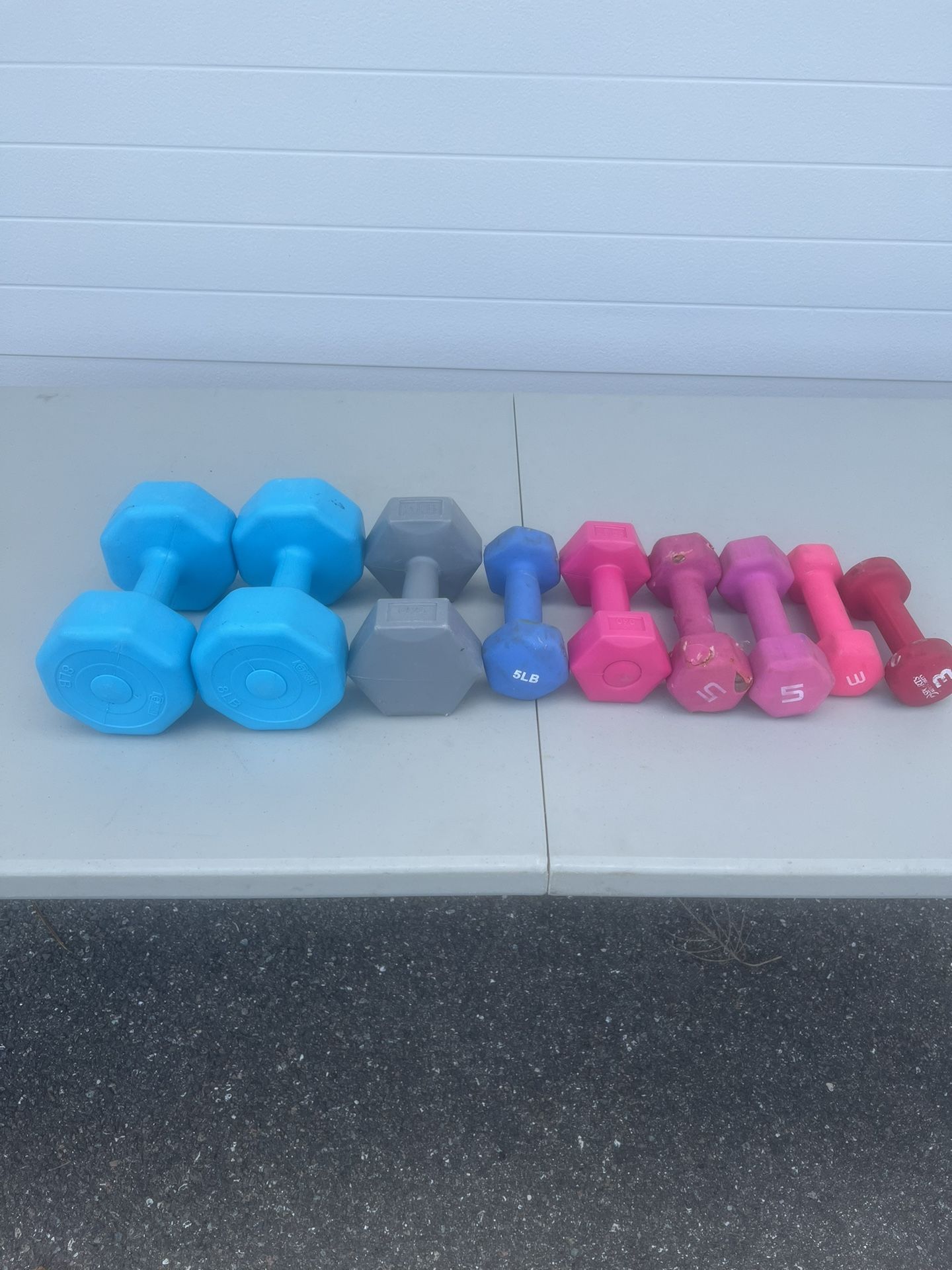 Dumbbell assorted lot plastic and rubber. 43 lbs total. Location below 31705 SR-54 Wesley Chapel,