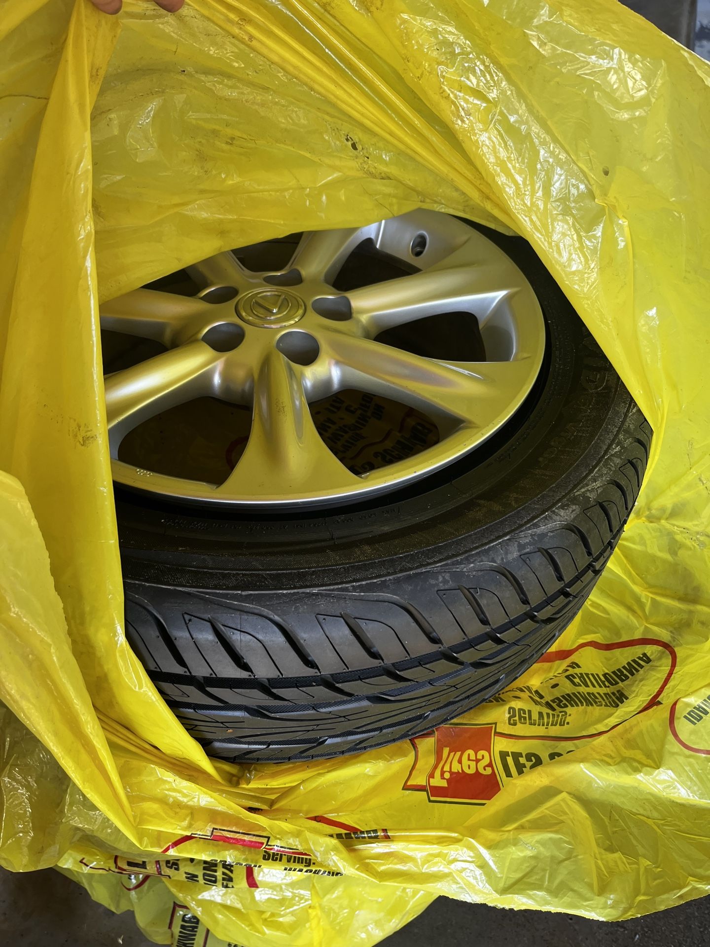 Full set of tires and stock rims for Lexus RX350