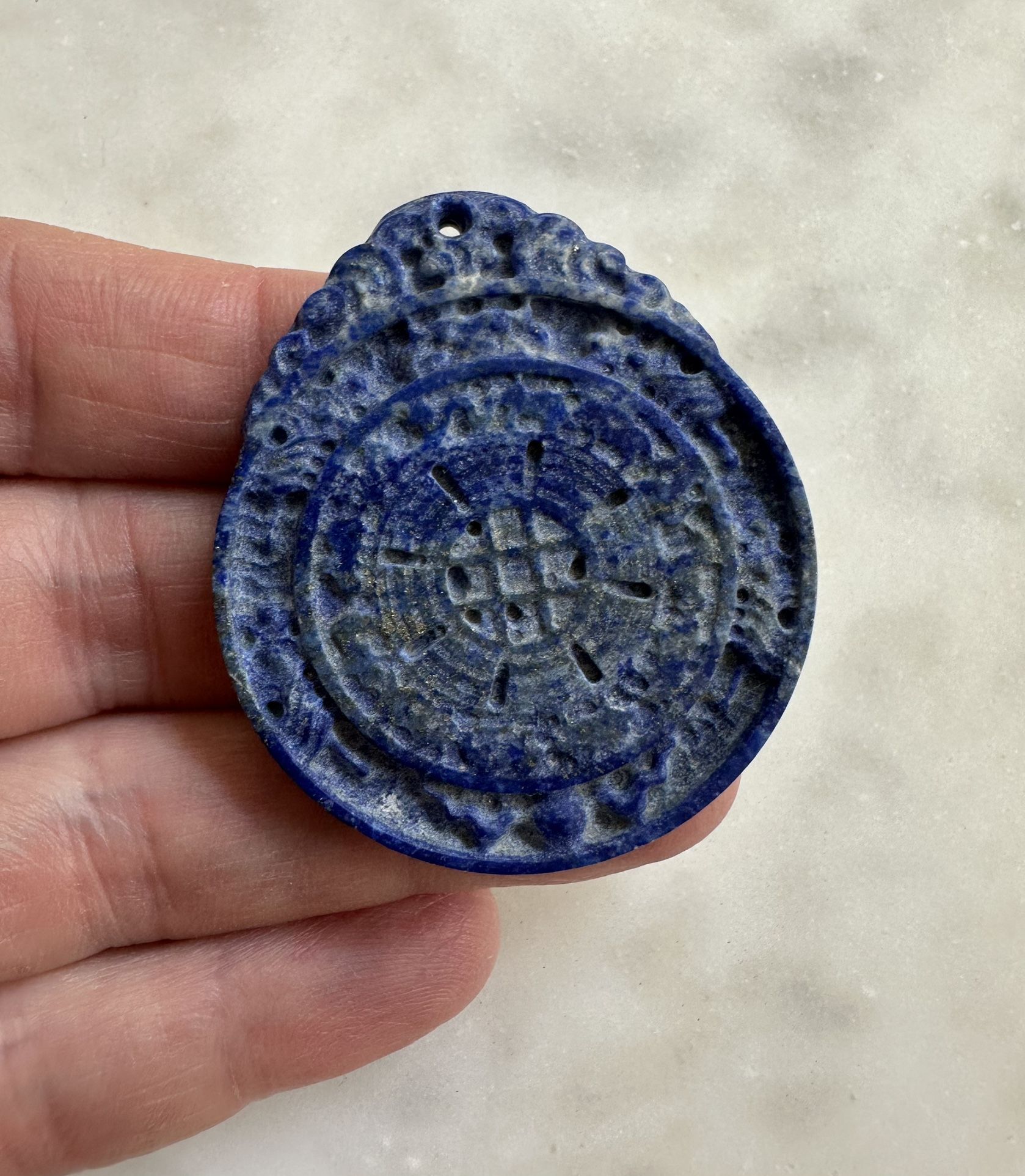 Carved genuine, lapis lazuli stone pendant