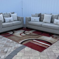 Cindy Crawford Home Chelsea Hills Gray Sofa and Loveseat. In great condition. Delivery available for an additional cost.