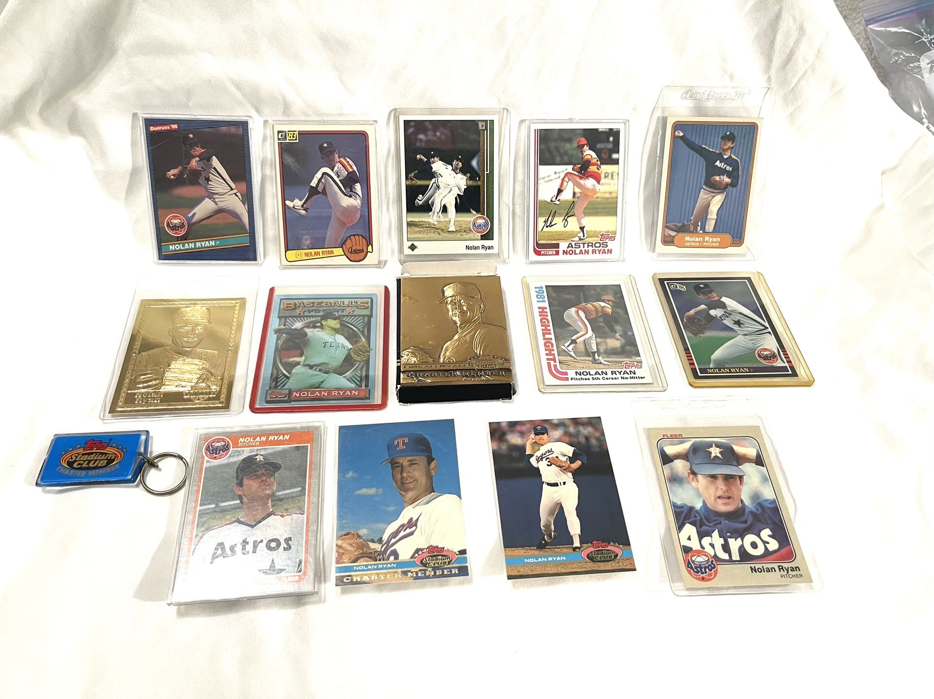 Big Collection, Different Years (Nolan Ryan) played for different teams, trading cards, and bronze medals
