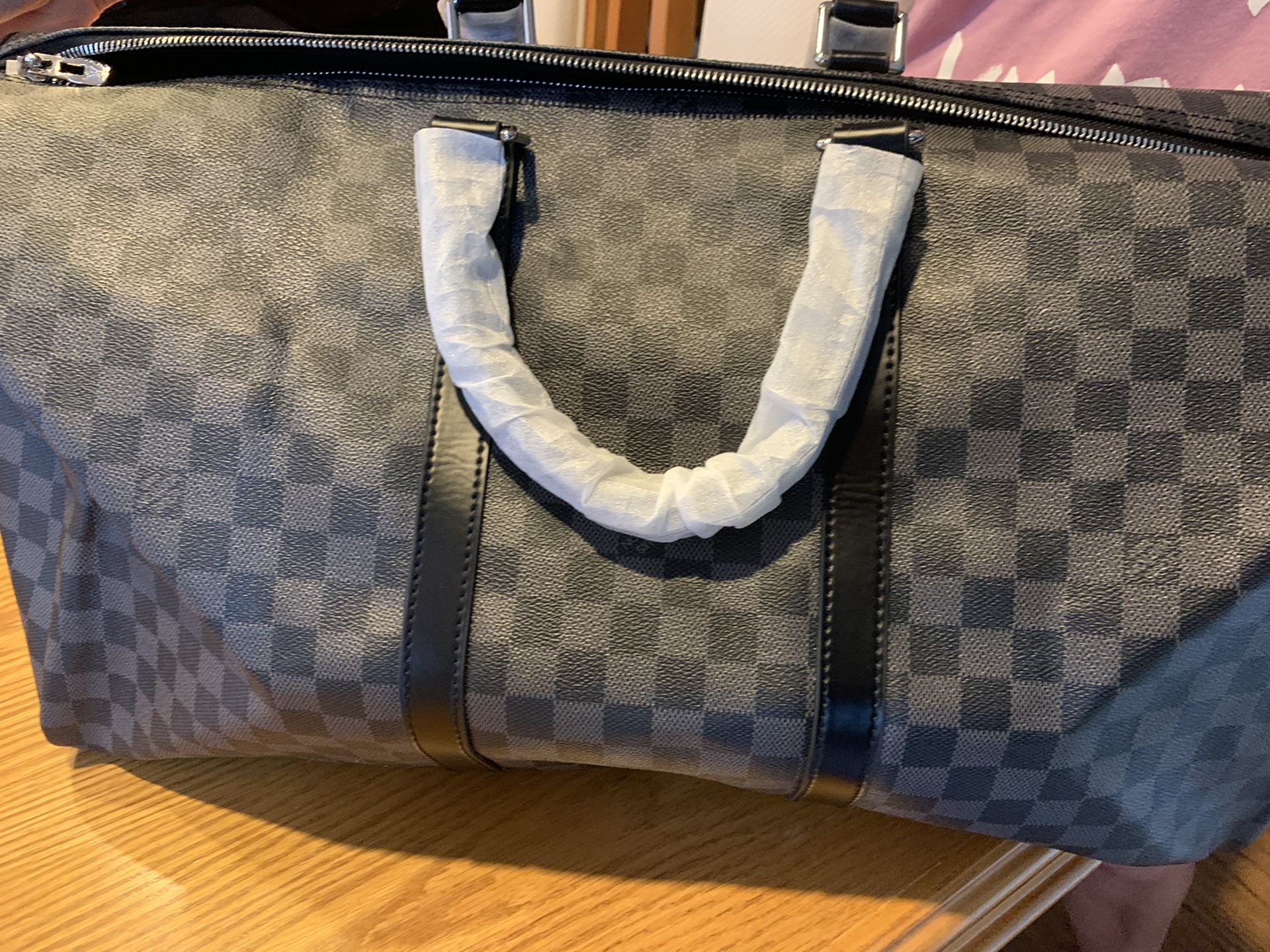 Luis Vuitton graphite bag