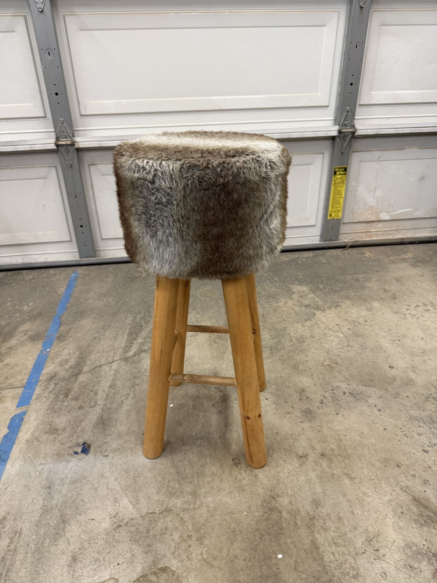 Bar stool with a faux fur seat