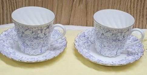 Pair of Russian Porcelain Demitasse Cups & Saucers – White Floral Design
