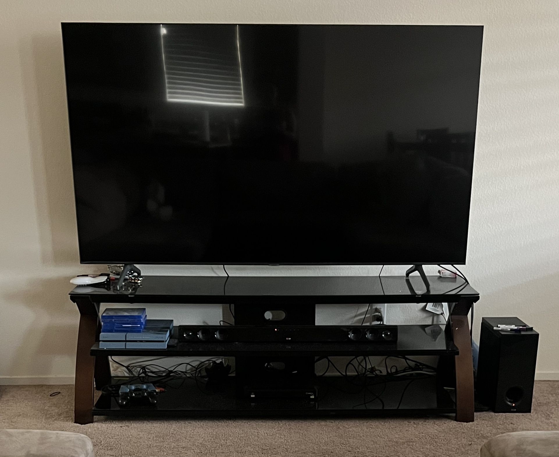 75 Inch Samsung TV with TV Stand Included!