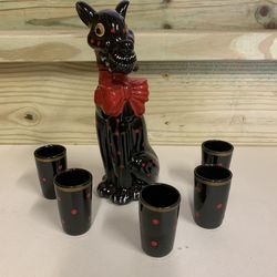 Vintage 1960’s polka dotted dog decanter w/ 5 shot glasses