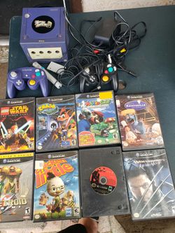 Nintendo GameCube Purple Doc 001 With all Cables. 2 Controls. 1 Mic. 8 Great Games. For $320!. Or trade are welcome. All works 100% Game Cube