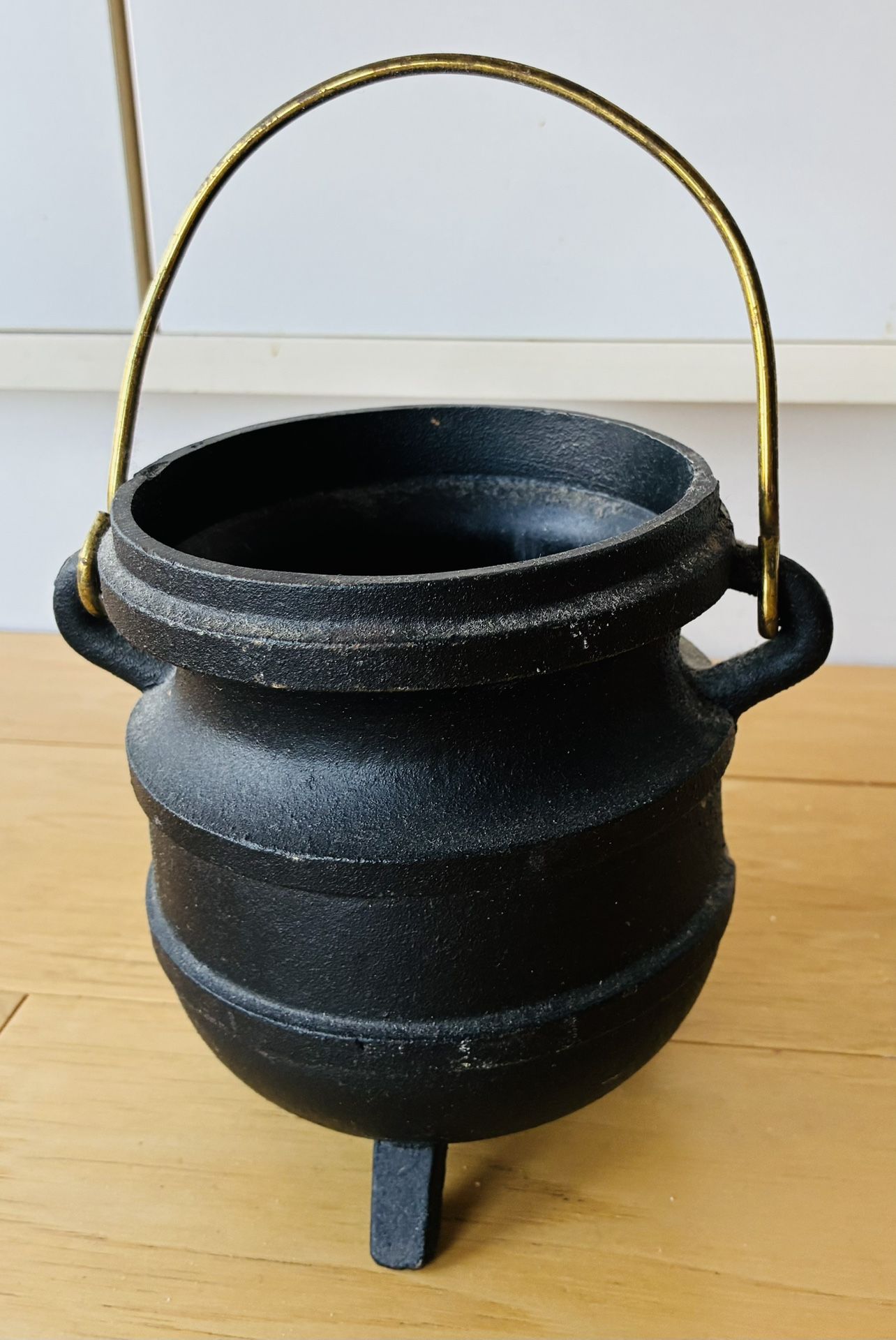 Cauldron, Black Metal w/feet and handle. 6” TallX5” Diameter.