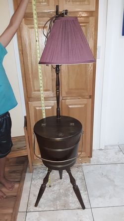 Antique wood table with lamp
