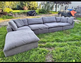 Grey feather sectional couch