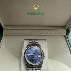 Rolex watch $235