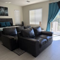 Faux, leather sofa, and loveseat.