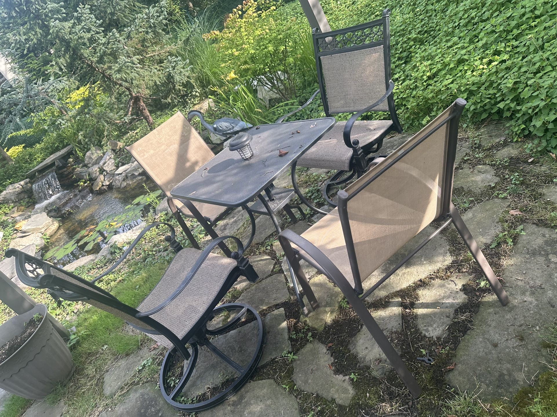 28” table and chairs 2 swivel chairs 24” tall