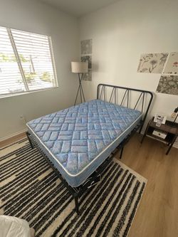 Full size bed frame, mattress, and topper
