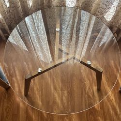 Wood table with 35 inch glass top